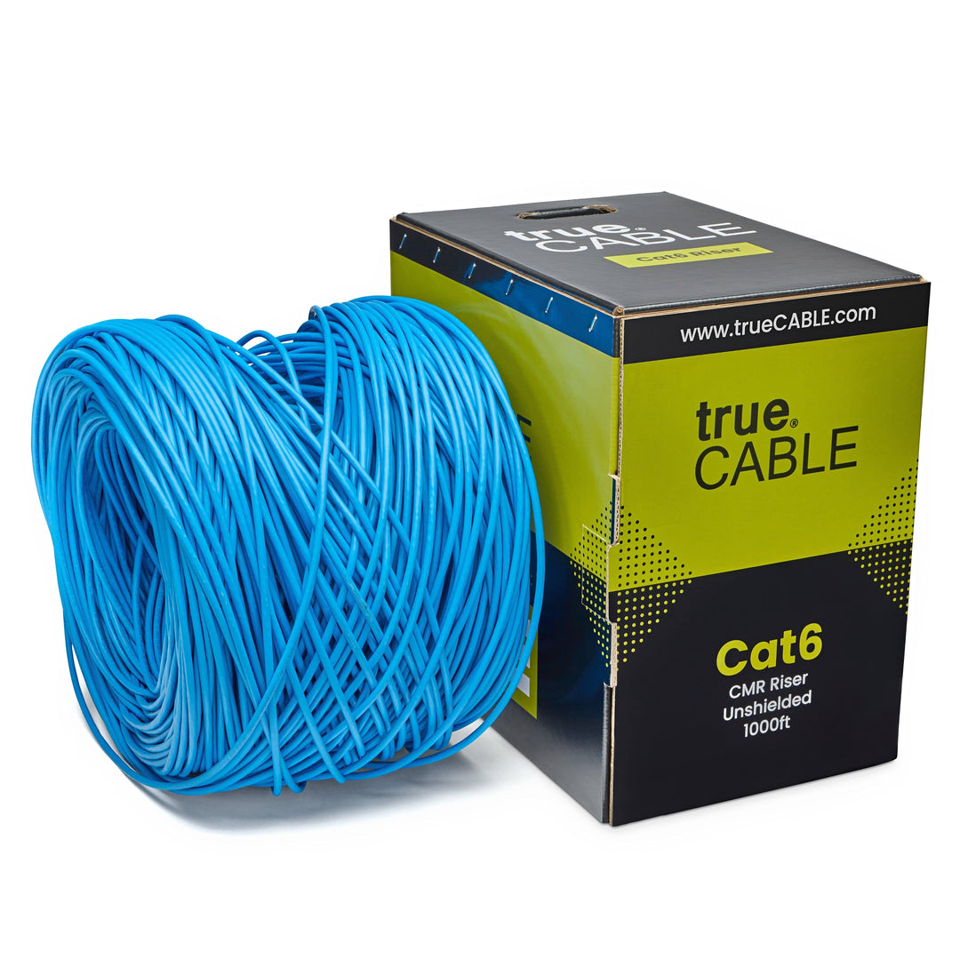 A spool of blue Cat6 cable on a white background. The spool is labeled "TrueCABLE Cat6 CMR Riser Unshielded 1000ft Blue Ethernet Cable"
